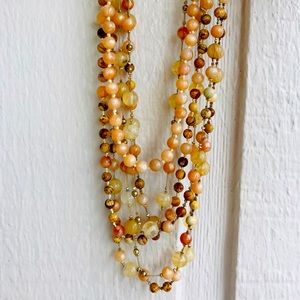 Tiered beaded earth toned necklace
